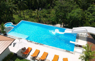 Illustration for article titled Every House Should Have a 256-Foot Double Loop Water Slide